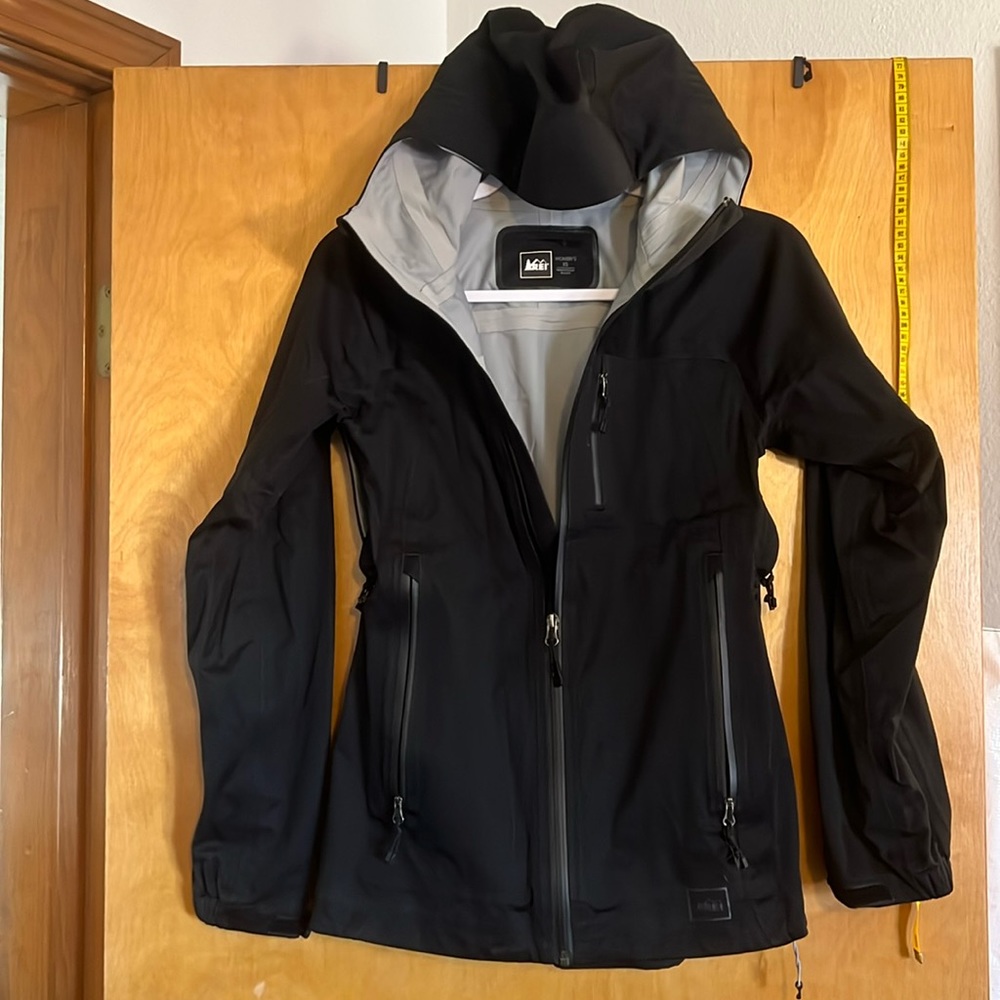 REI women’s waterproof rain shell “like new” worn a few times.